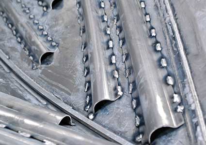 Machine formed ribs